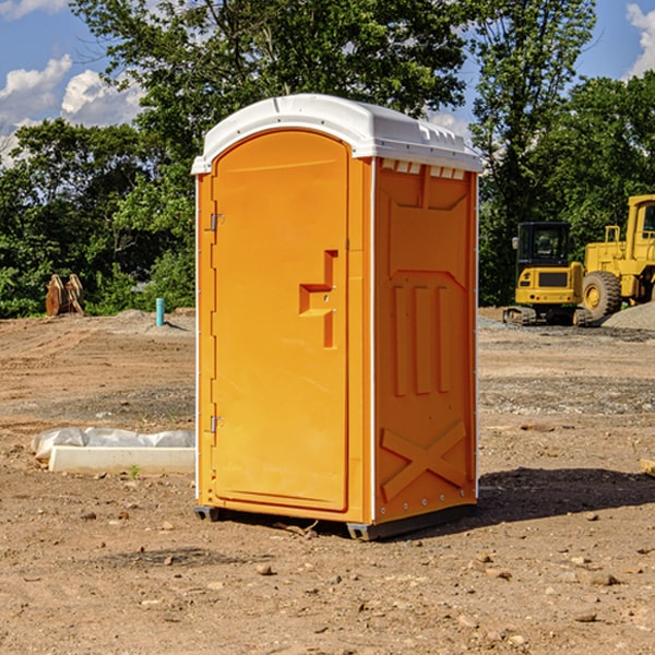 how often are the portable restrooms cleaned and serviced during a rental period in Pine Lake